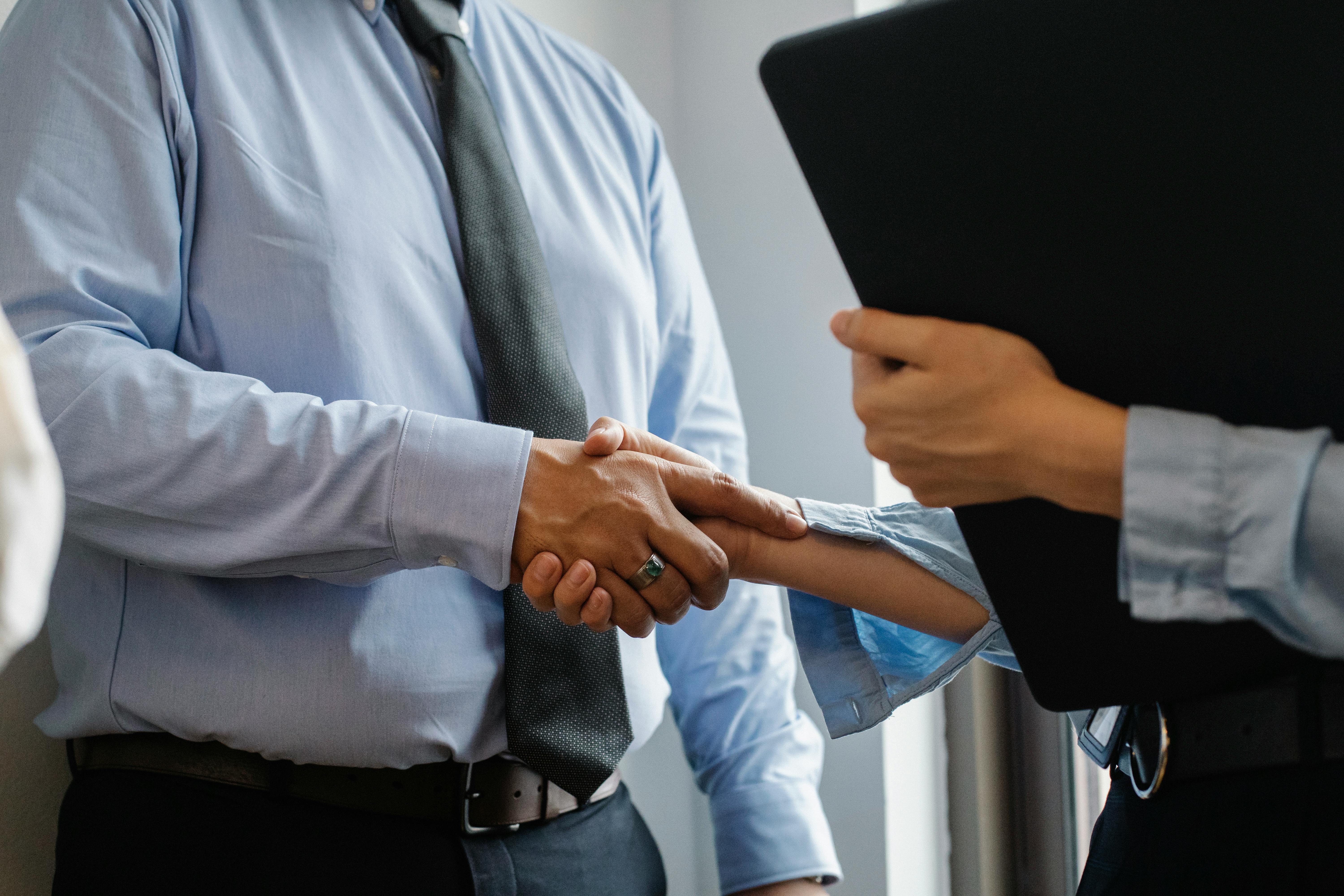 two business people shaking hands