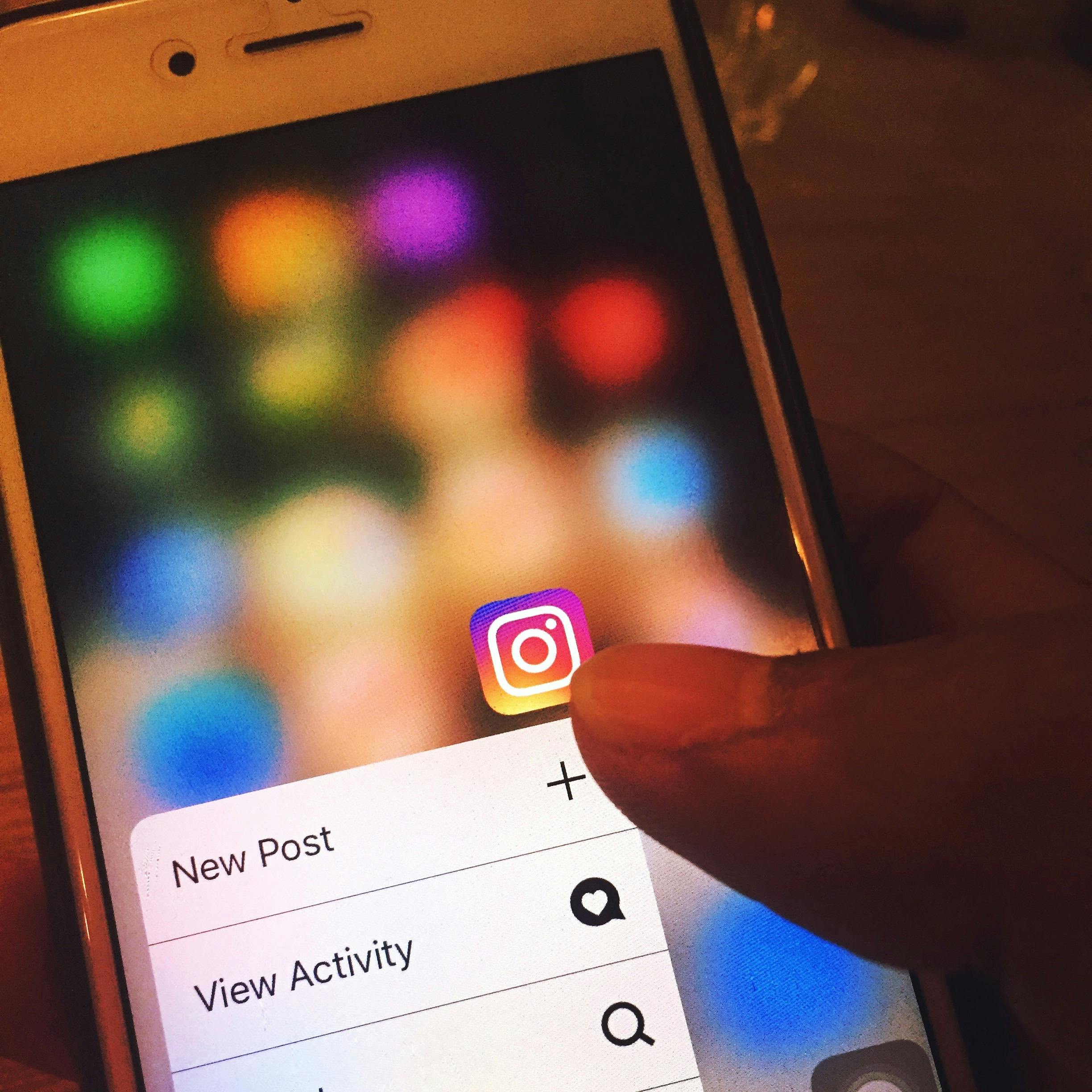 iPhone with Instagram app highlighted