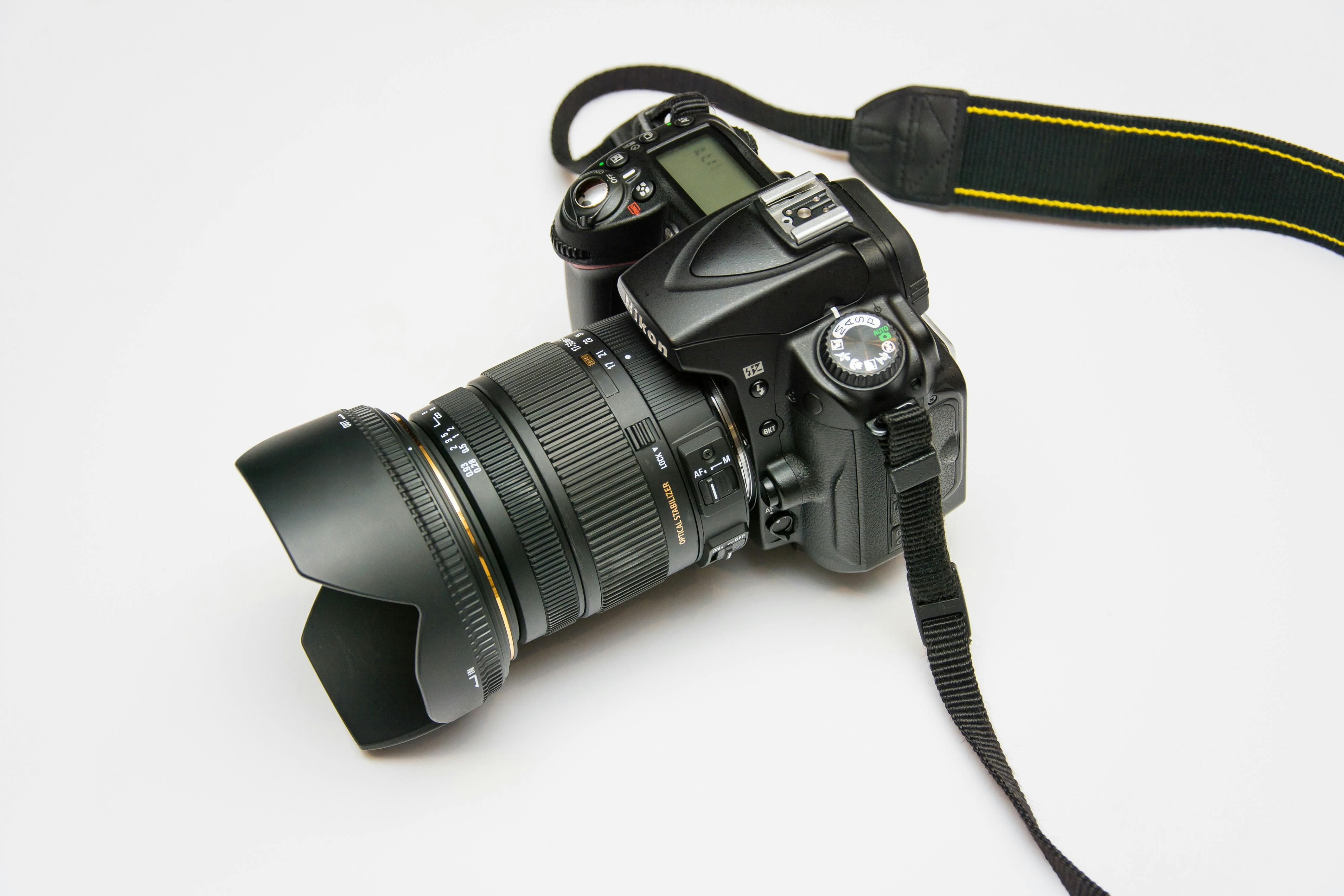 DSLR camera with lens and strap