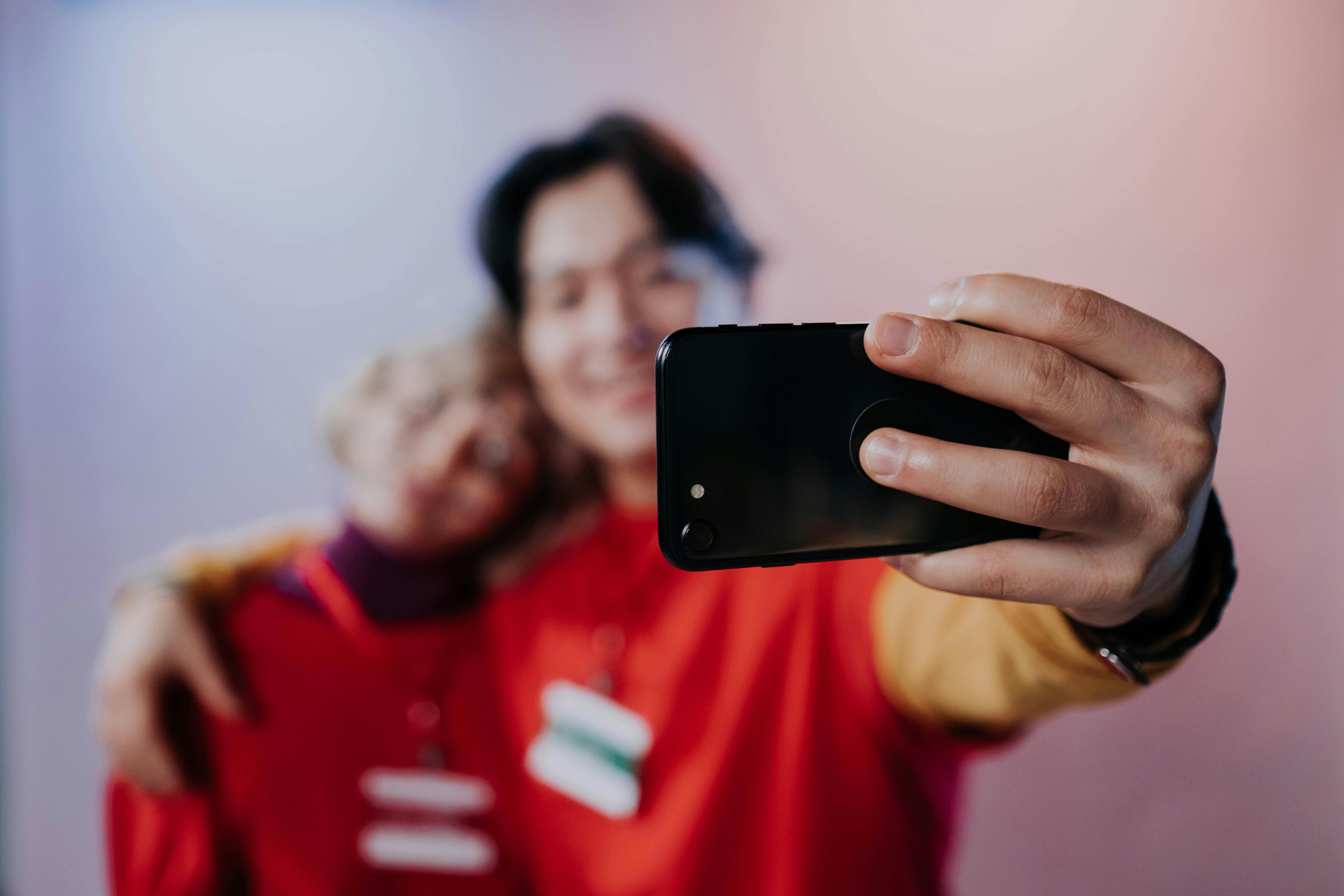 Two people taking a selfie together.